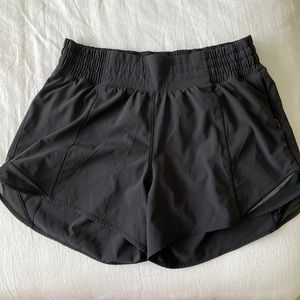 Black lululemon size 6 tall hotty hot shorts. Good used condition